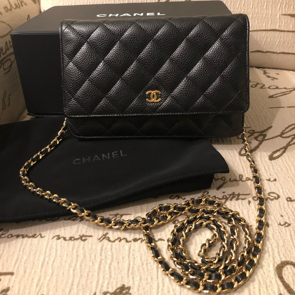 Chanel caviar woc black gold hardware
